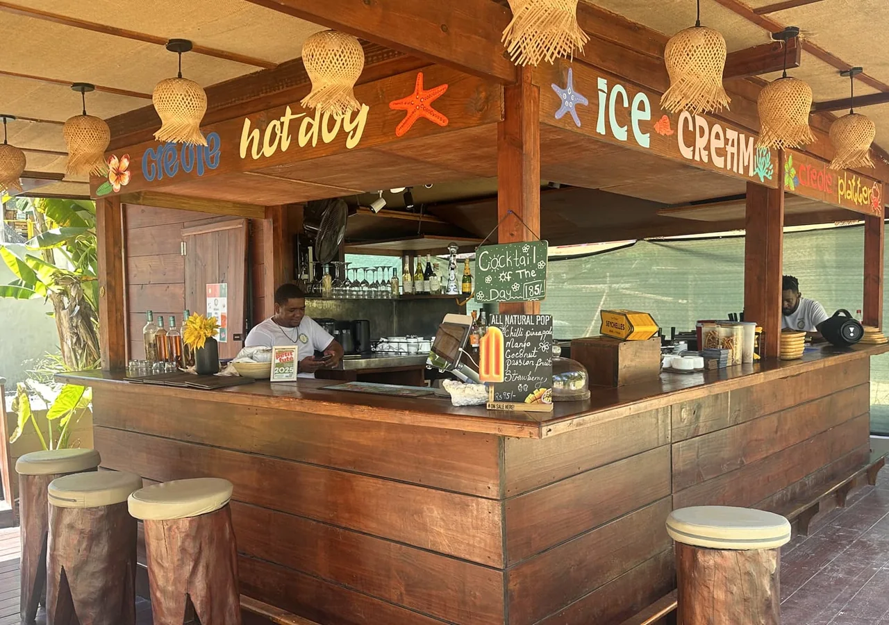 The wooden beach bar at Banana Sea Club